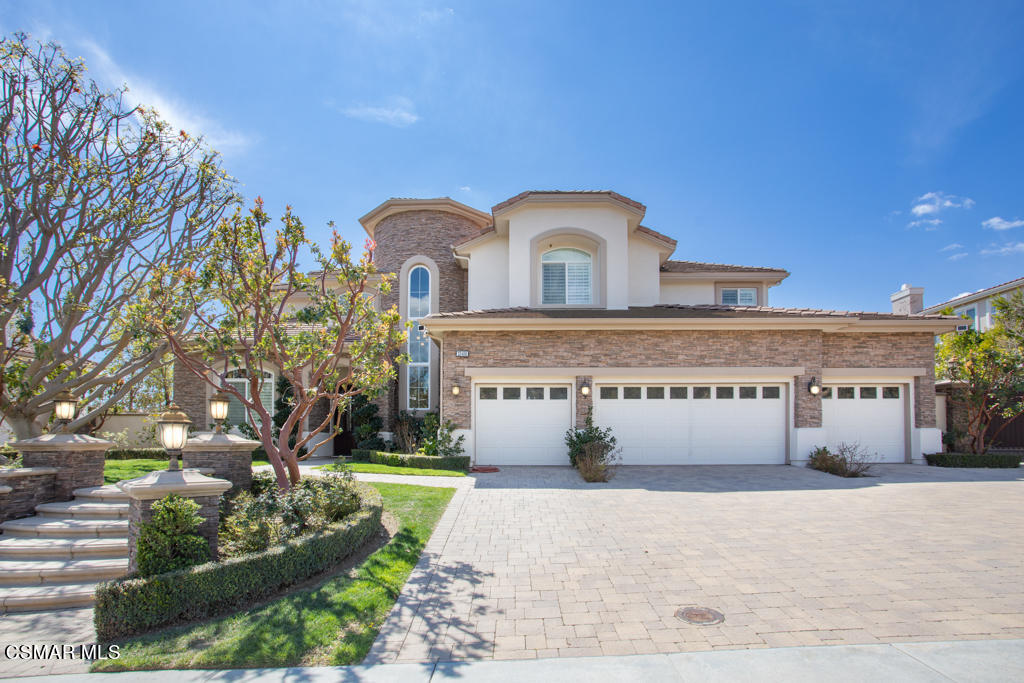 12406 Nelson Road Moorpark, CA 93021 - Photo 70 of 74 a front view of a house with a garden