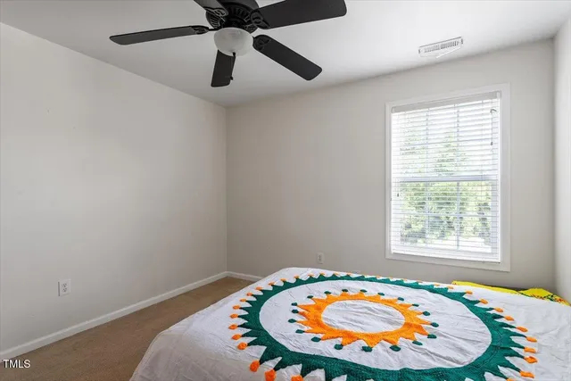 an aerial view of a swimming pool and outdoor space