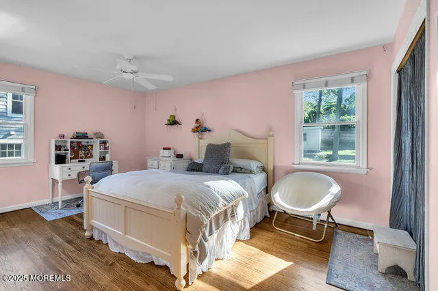 a bed room with a bed and a window