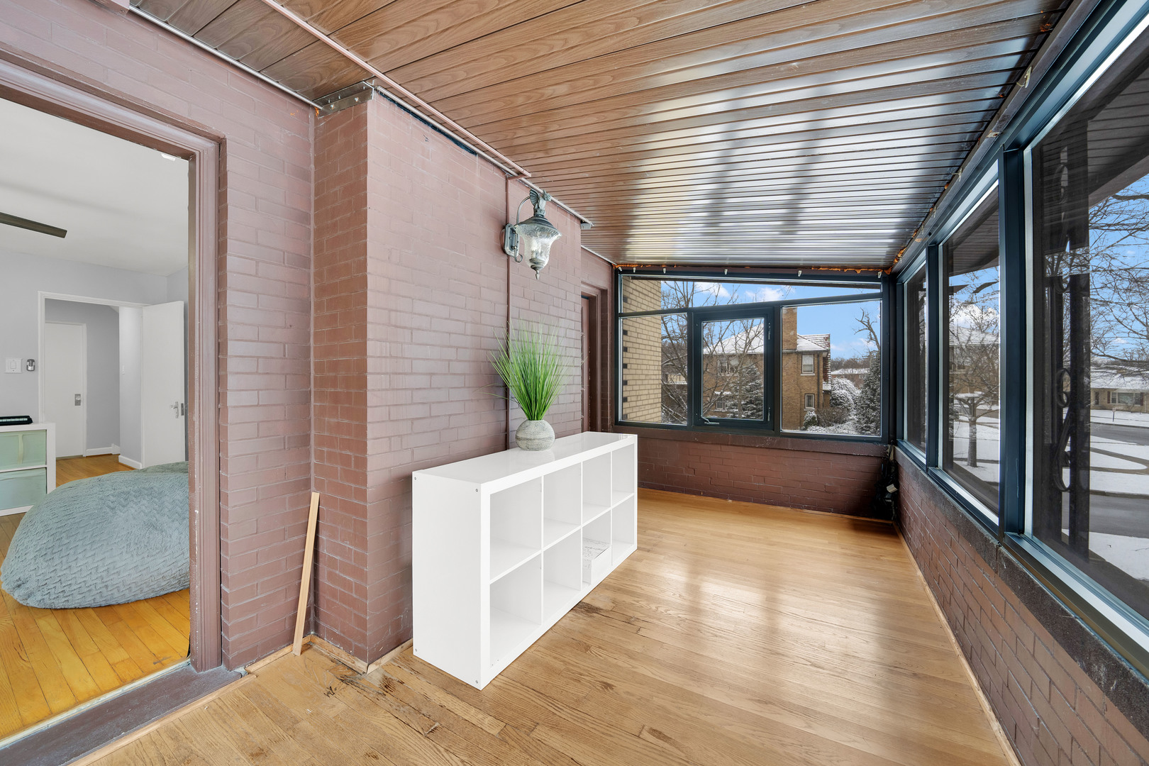 478 Kent Road Riverside, IL 60546 - Photo 23 of 41 a view of balcony with a large window and wooden floor