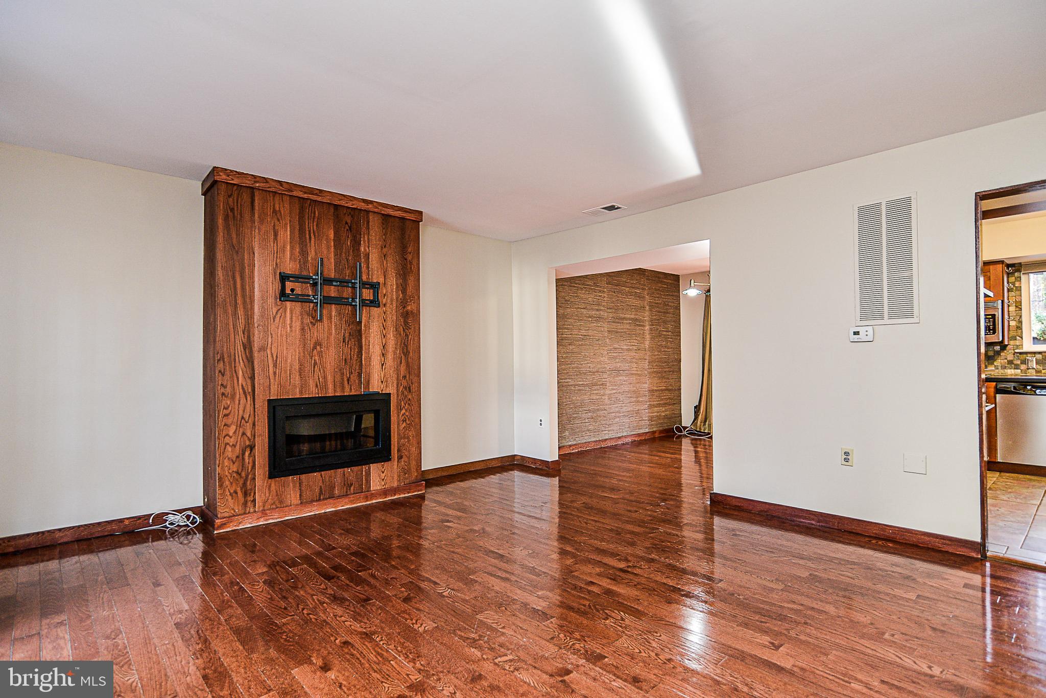 2430 Cloudcroft Square Reston, VA 20191 - Photo 4 of 27 Beautiful wooden fireplace and TV mount