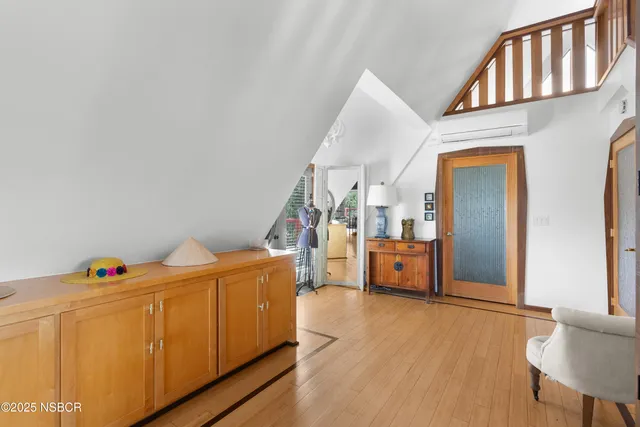 a view of a house with a mountain in the background