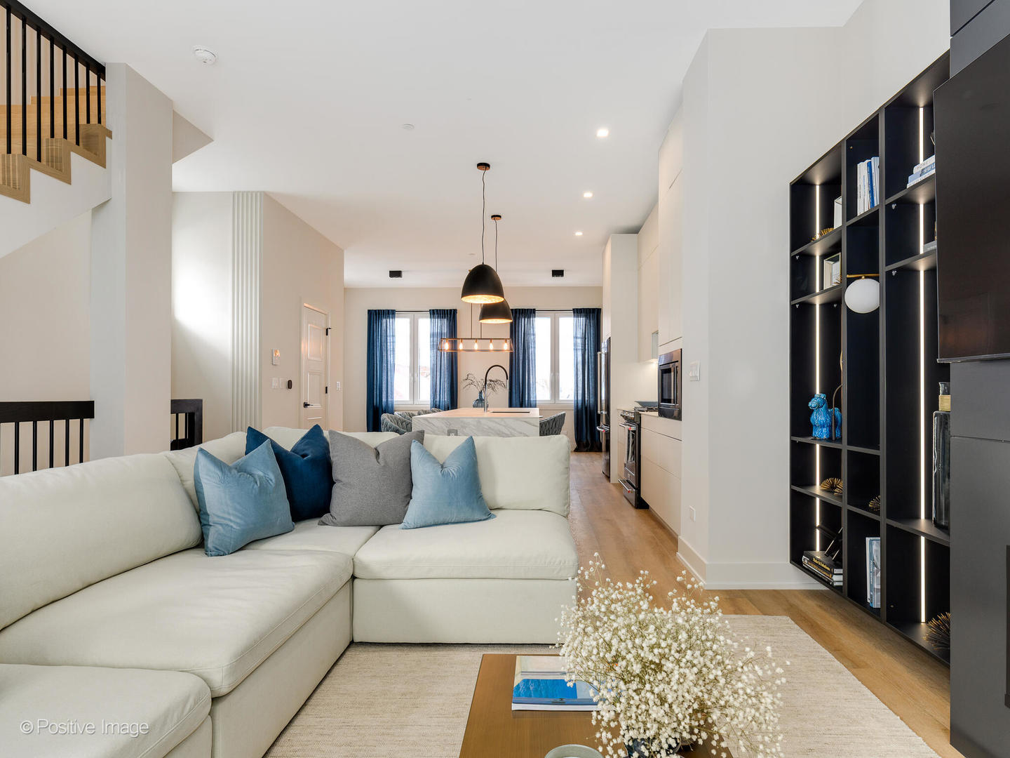 4232 West Belmont Avenue, Unit 6 Chicago, IL 60641 - Photo 13 of 24 a living room with furniture and a rug