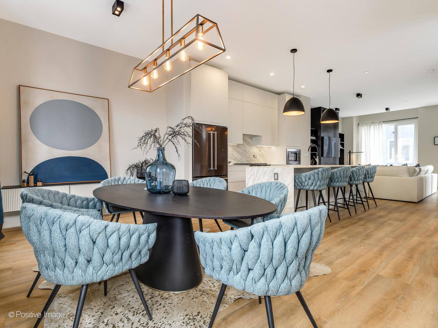 4232 West Belmont Avenue, Unit 6 Chicago, IL 60641 - Photo 8 of 24 a living room with furniture a table and chairs