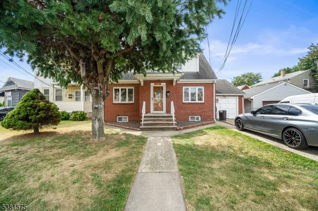 a house view with a garden space