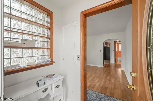 a view of gallery with wooden floor