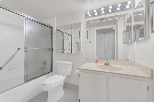 a view of a lake with a city