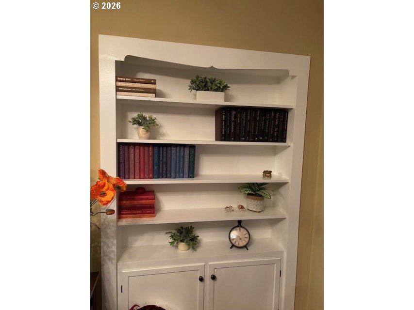 2027 North Webster Street Portland, OR 97217 - Photo 6 of 16 a shelf with cup and plates