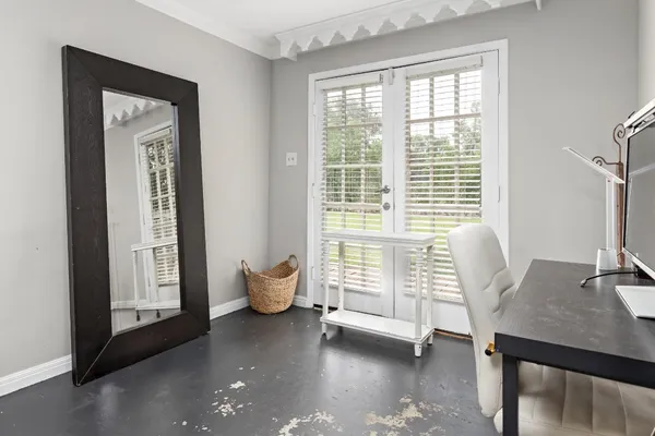 a view of bathroom with a mirror