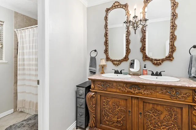a view of bathroom with a mirror