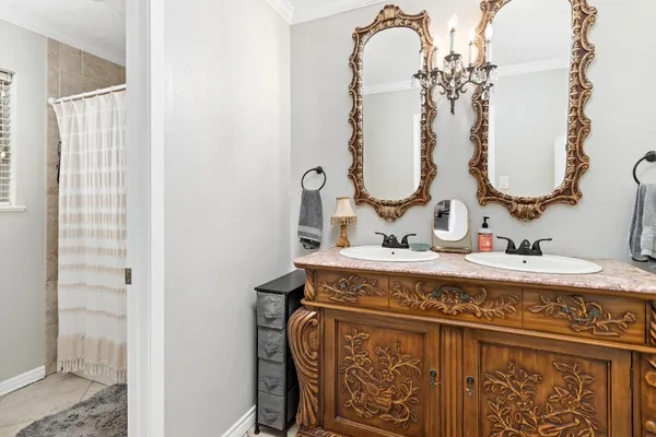 a bedroom with a bed and a desk