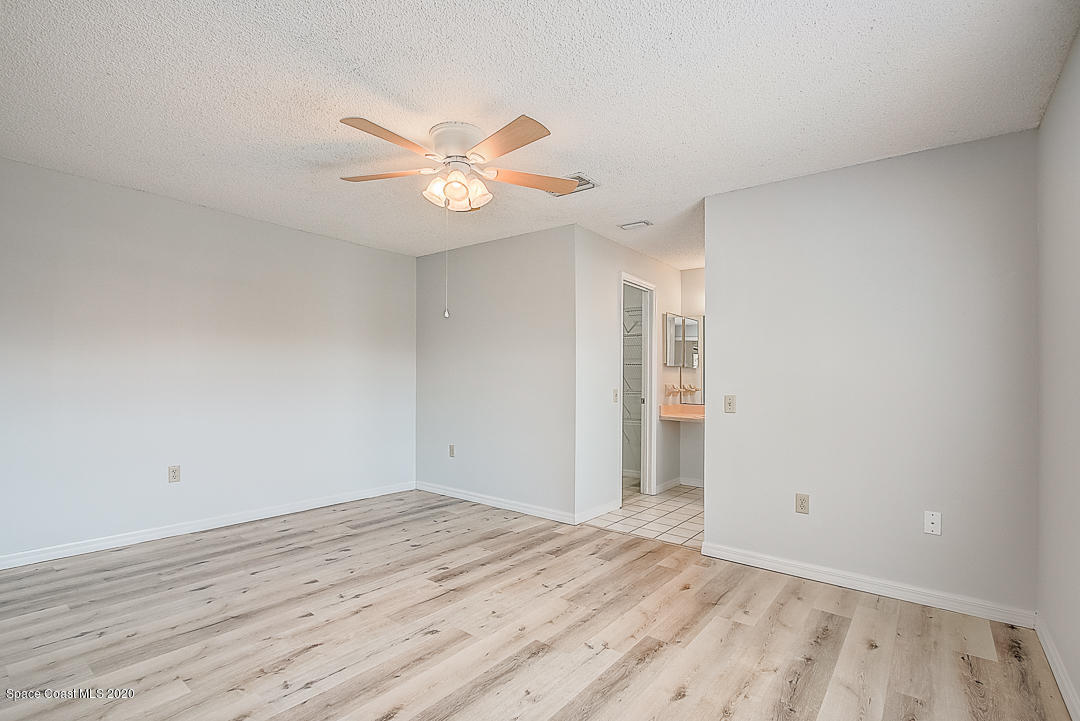 192 Cinnamon Bay Lane Melbourne, FL 32901 - Photo 15 of 34 wooden floor in an empty room