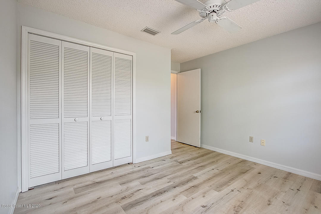 192 Cinnamon Bay Lane Melbourne, FL 32901 - Photo 27 of 34 wooden floor in an empty room