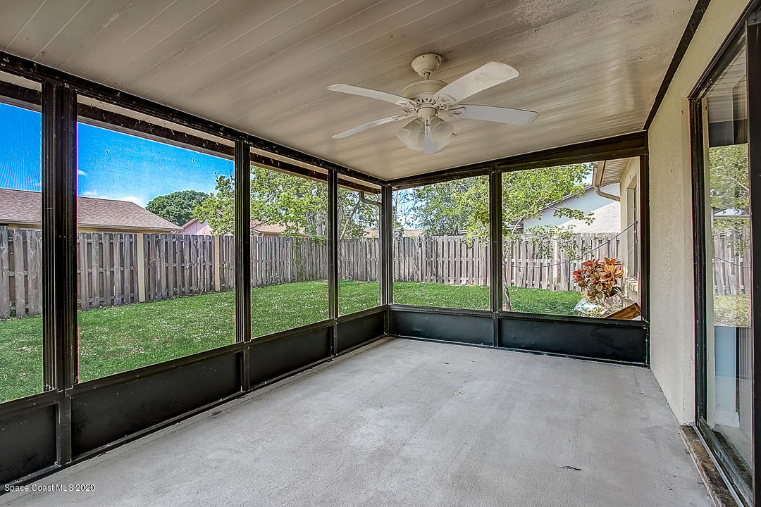 192 Cinnamon Bay Lane Melbourne, FL 32901 - Photo 28 of 34 a view of a big room with large windows