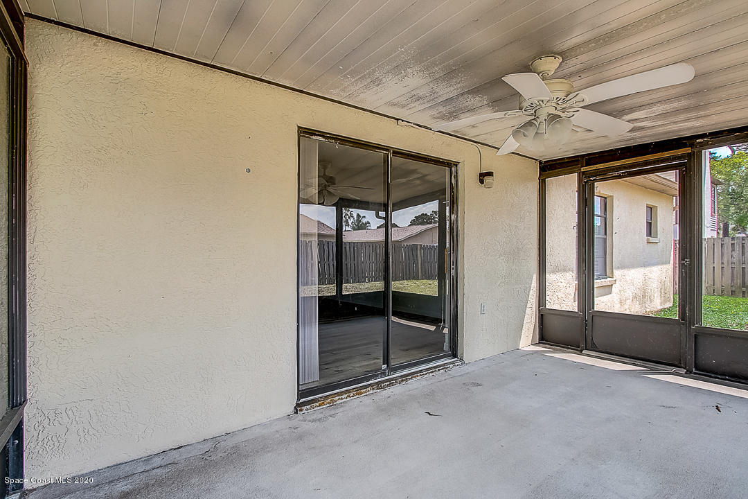 192 Cinnamon Bay Lane Melbourne, FL 32901 - Photo 29 of 34 a view of an empty room with a fireplace