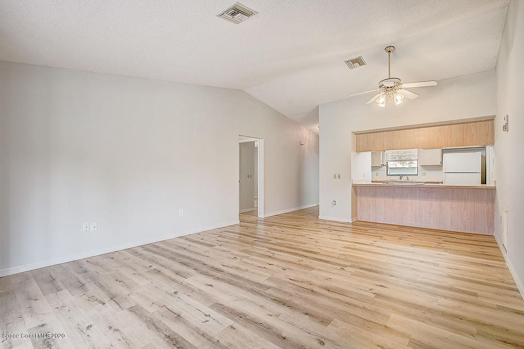 192 Cinnamon Bay Lane Melbourne, FL 32901 - Photo 10 of 34 wooden floor in an empty room