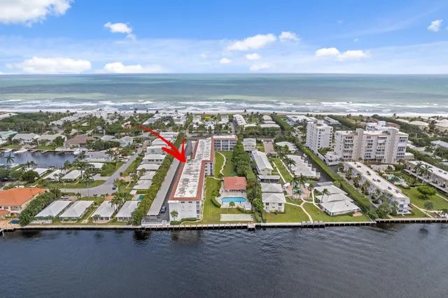 a picture of a bench in front of a building