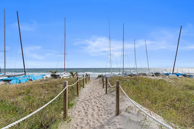 a front view of a building with garden