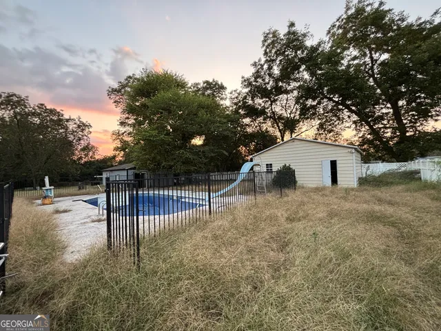 a view of backyard and tree