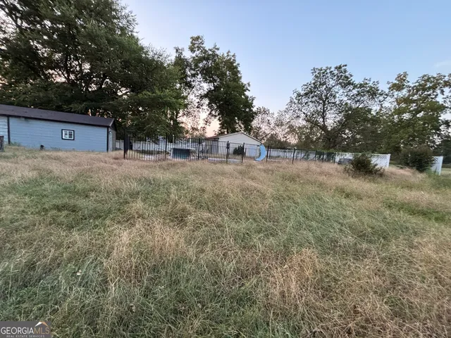 a view of a pathway both side of yard