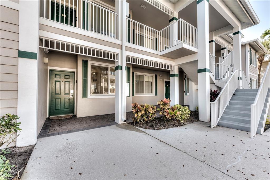 7955 Mahogany Run Lane, Unit 514 Naples, FL 34113 - Photo 3 of 30 a view of a house with entrance