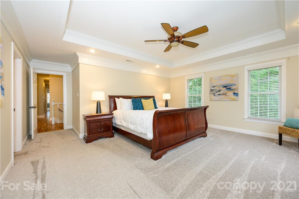 8456 Fairfield Forest Road Denver, NC 28037 - Photo 20 of 38 a bedroom with a bed and window