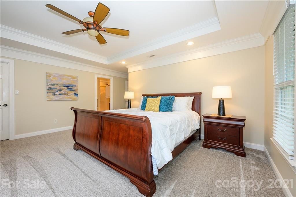 8456 Fairfield Forest Road Denver, NC 28037 - Photo 21 of 38 a bedroom with a bed and window