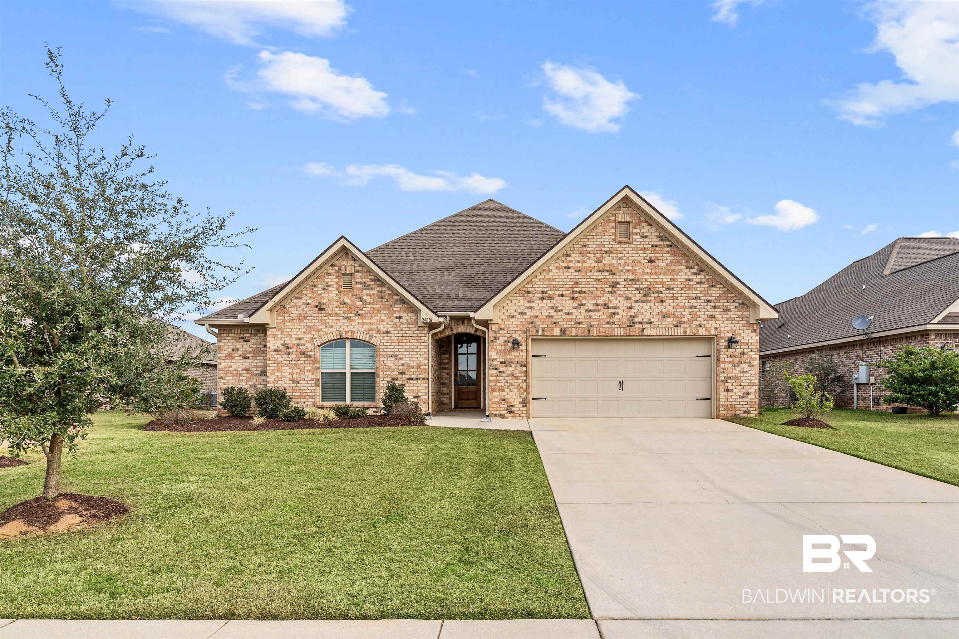 24838 Slater Mill Road Daphne, AL 36526 - Photo 1 of 46 Single story home with roof with shingles, a front lawn, brick siding, and driveway