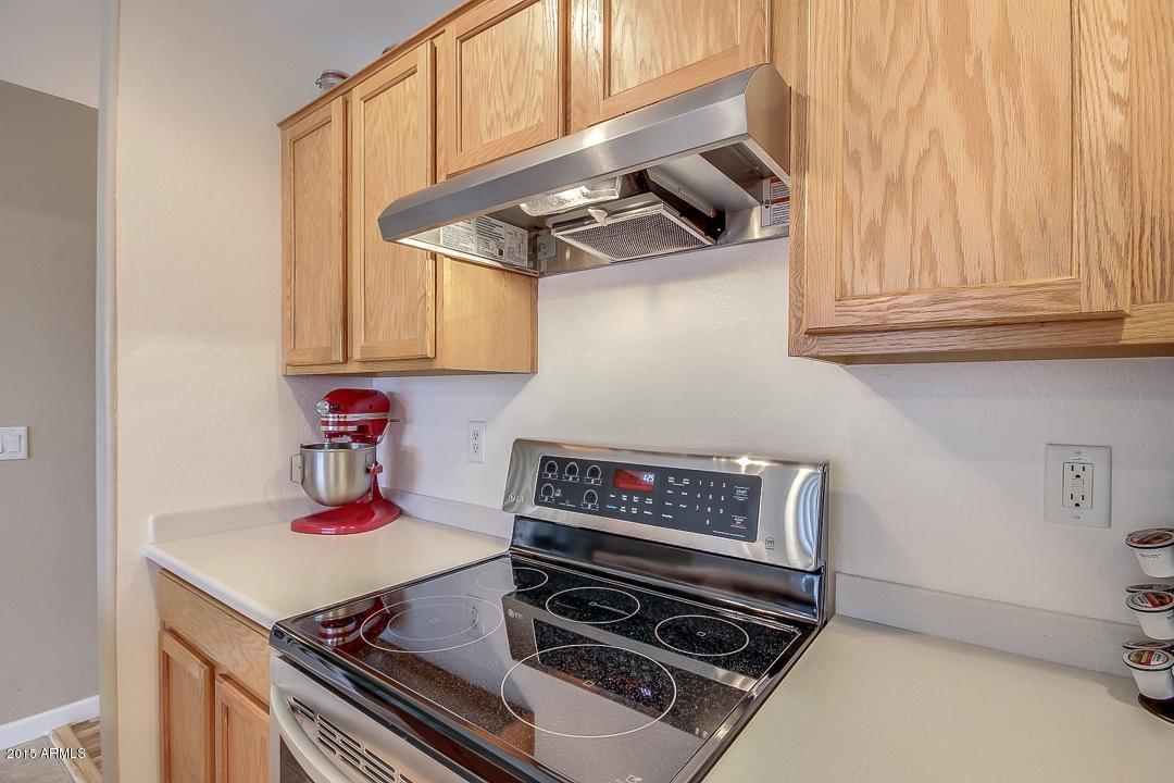 3837 South Joshua Tree Lane Gilbert, AZ 85297 - Photo 14 of 43 CORIAN COUNTER TOPS