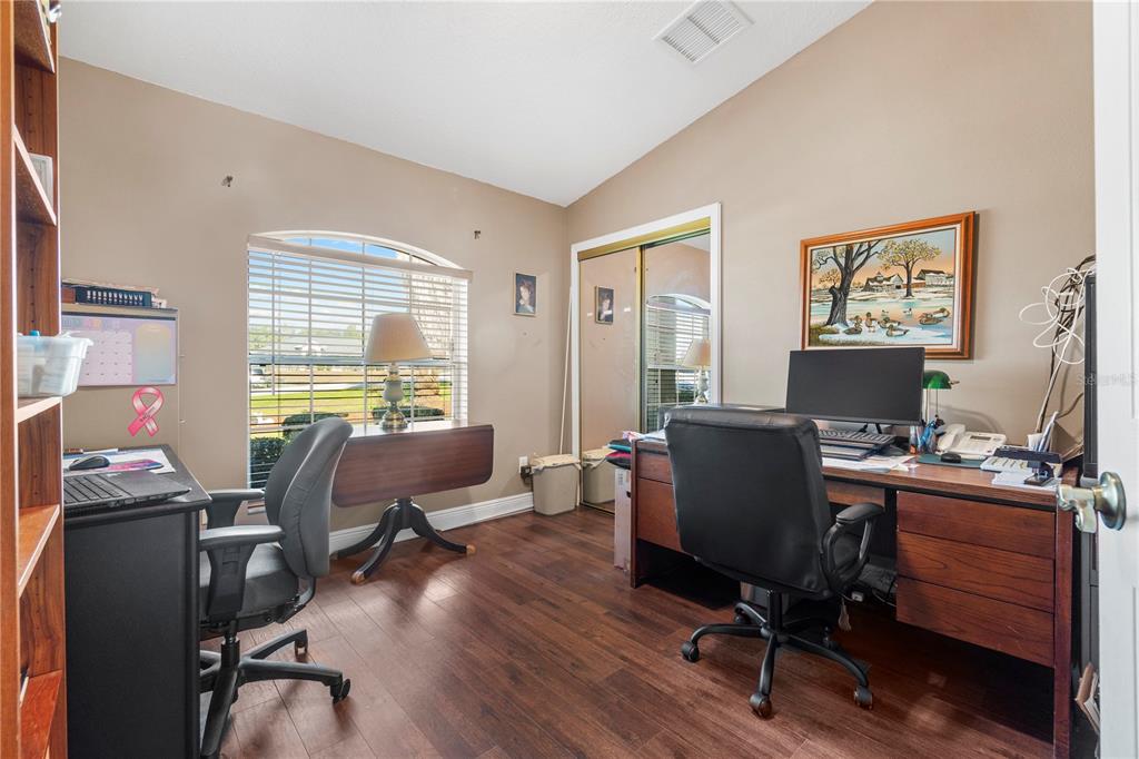 4642 Southwest 100th Lane Ocala, FL 34476 - Photo 11 of 61 a view of a workspace with furniture and a window