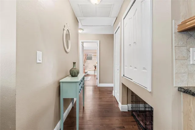 a bed sitting in a room next to a window