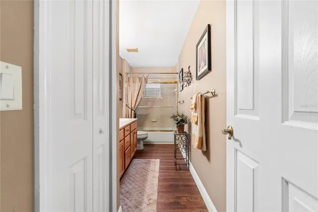 a bathroom with a double vanity sink mirror and double