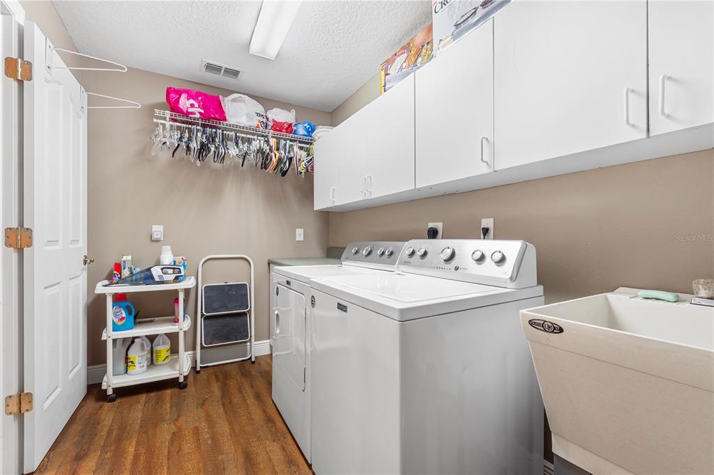 4642 Southwest 100th Lane Ocala, FL 34476 - Photo 38 of 61 a utility room with dryer and washer