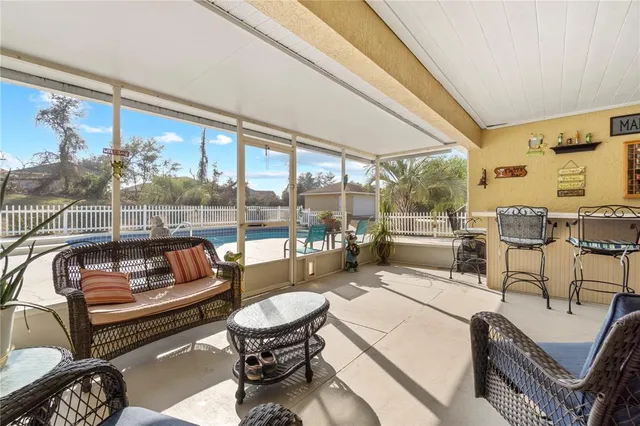 a view of a terrace with yard