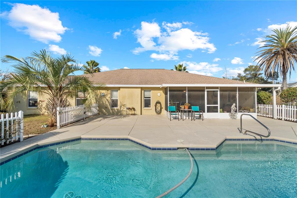 4642 Southwest 100th Lane Ocala, FL 34476 - Photo 48 of 61 a house view with a garden space