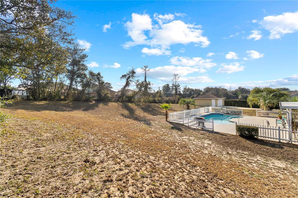 4642 Southwest 100th Lane Ocala, FL 34476 - Photo 49 of 61 a view of a terrace with yard