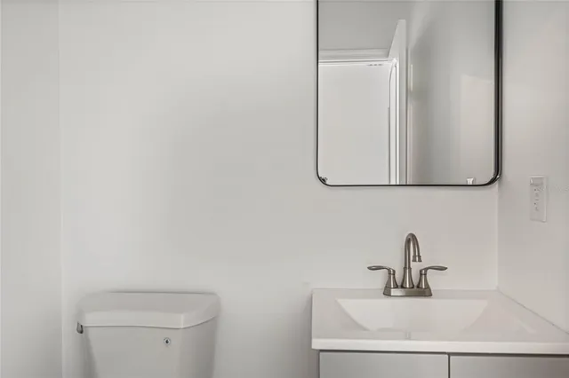 a bathroom with a sink and a toilet