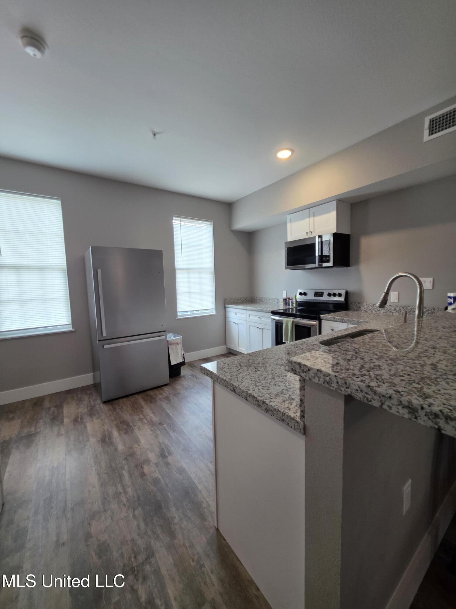 107 East Orchard Loop, Unit 107 D'Iberville, MS 39540 - Photo 5 of 15 20250916_111455