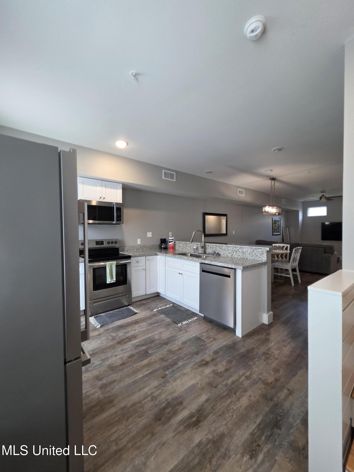 107 East Orchard Loop, Unit 107 D'Iberville, MS 39540 - Photo 6 of 15 20250916_111504