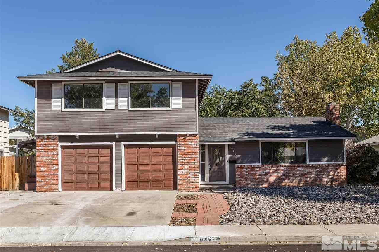 948 Rio Vista Drive Sparks, NV 89434 - Photo 1 of 1 a front view of a house with garden