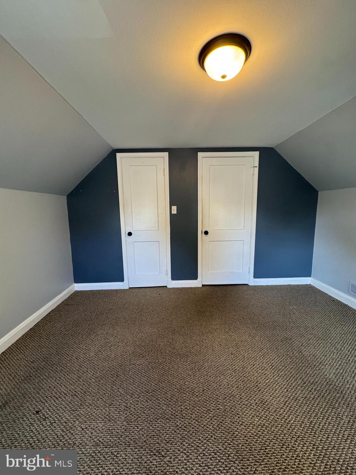 2-7408 Digby Road, Unit 2 Gwynn Oak, MD 21207 - Photo 3 of 12 an empty room with a window