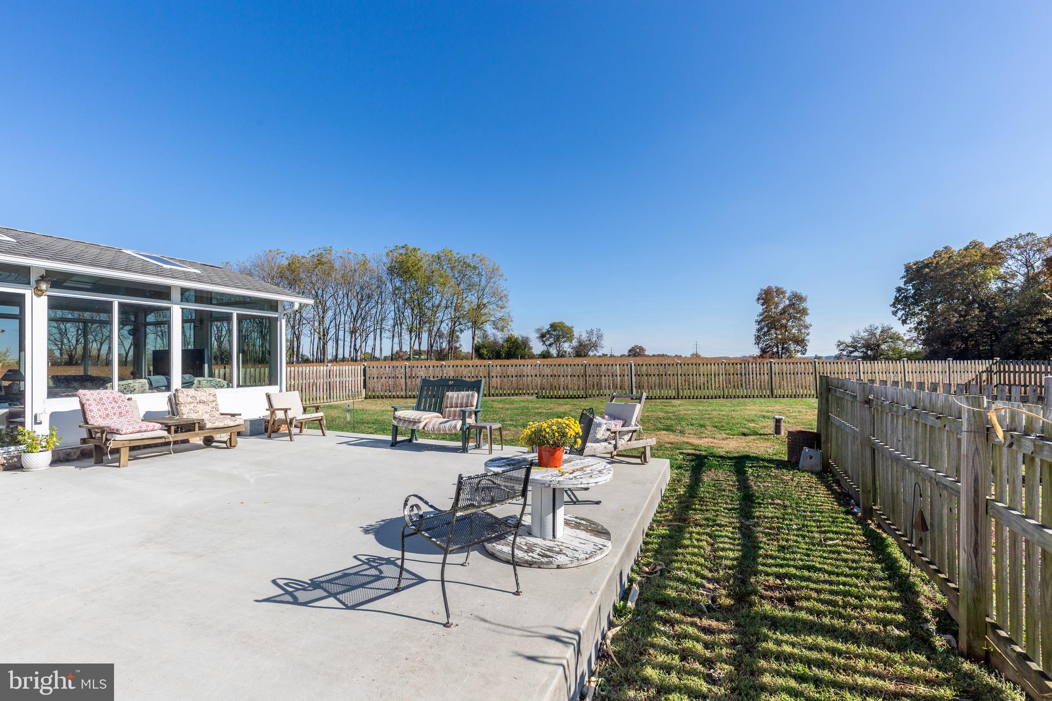 4855 Stonesifer Road Taneytown, MD 21787 - Photo 33 of 65 a view of swimming pool with outdoor seating and a terrace view