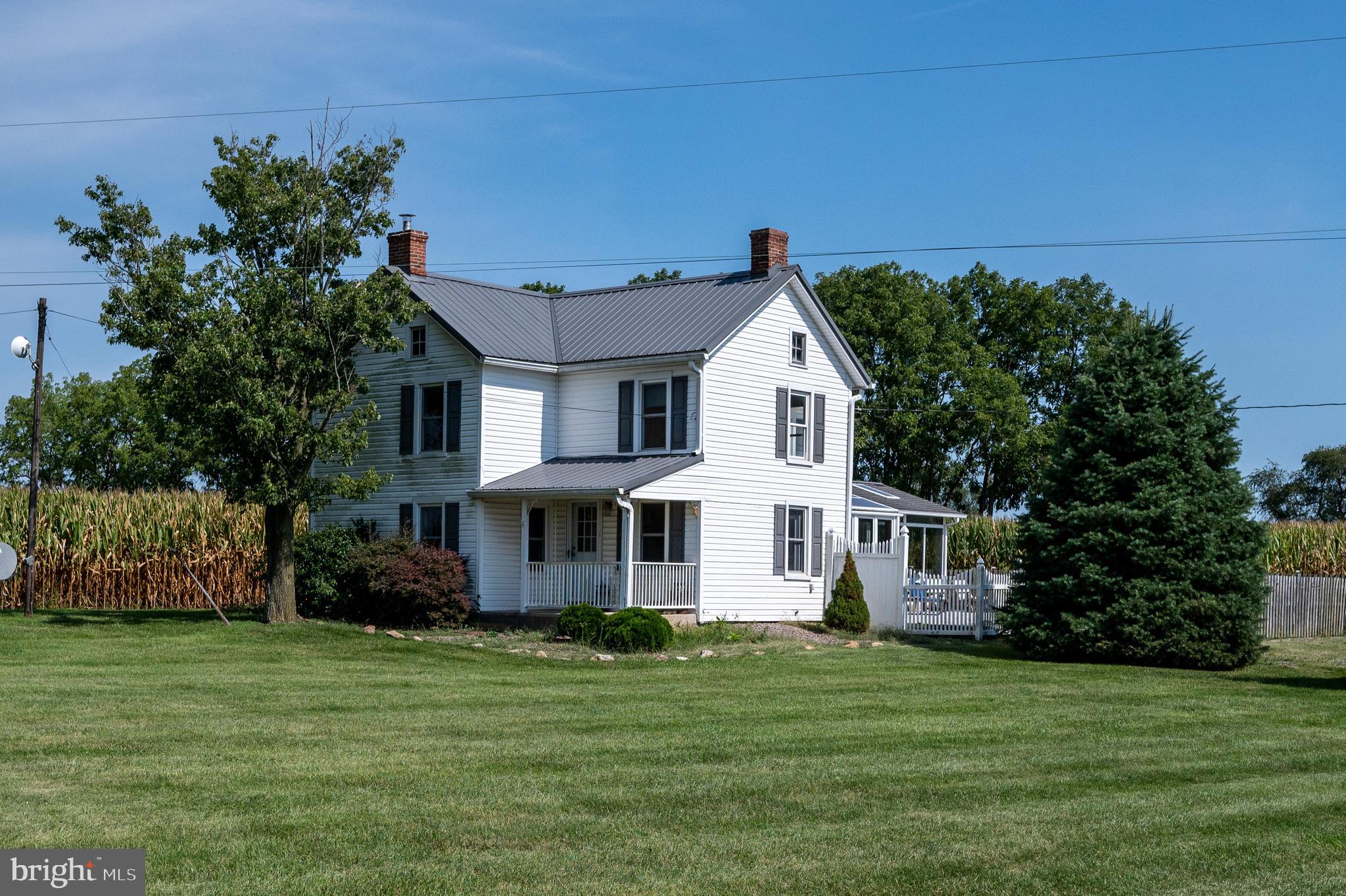 4855 Stonesifer Road Taneytown, MD 21787 - Photo 39 of 65 a front view of a house with a garden