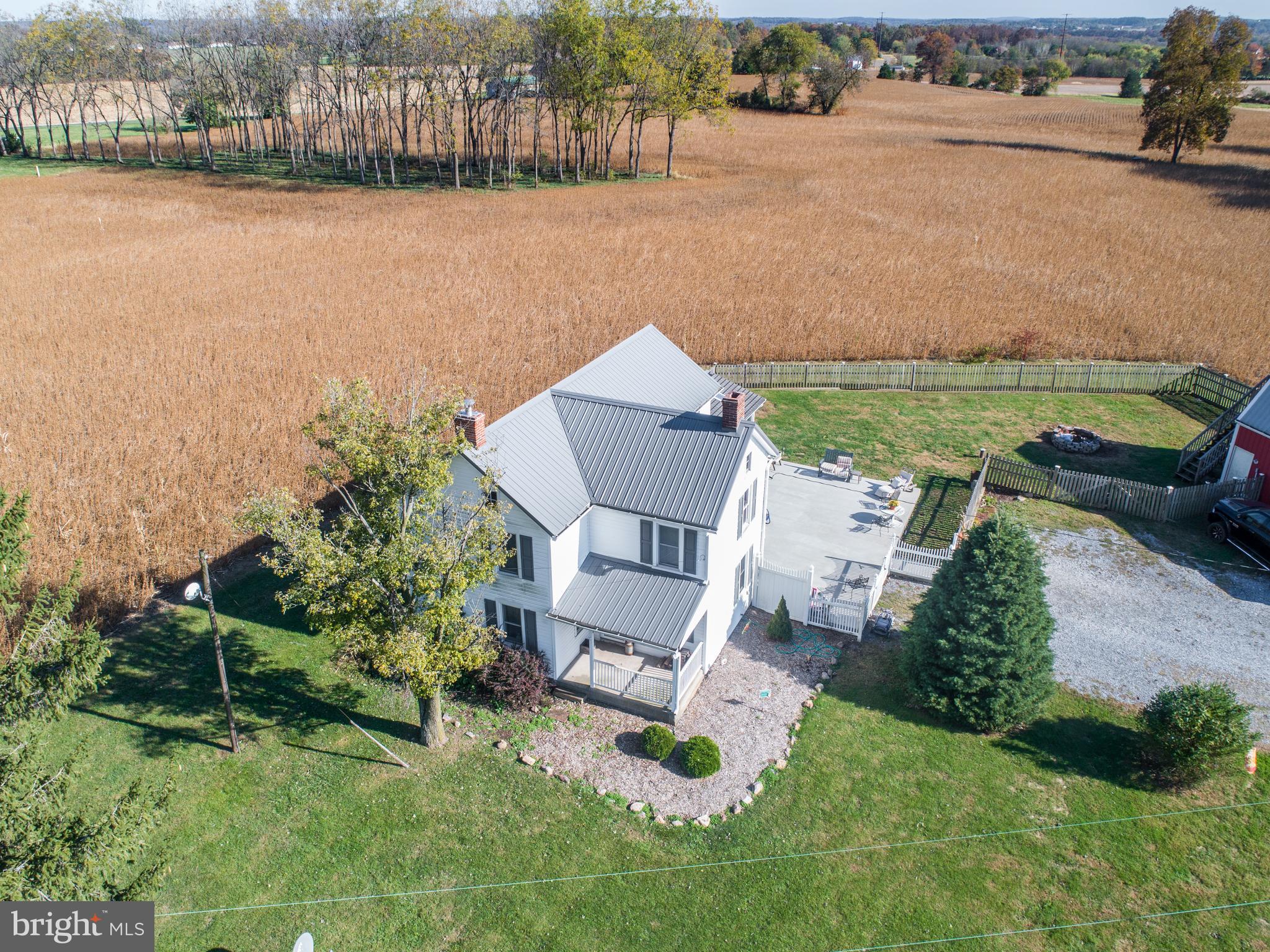 4855 Stonesifer Road Taneytown, MD 21787 - Photo 42 of 65 an aerial view of a house with a garden and lake view