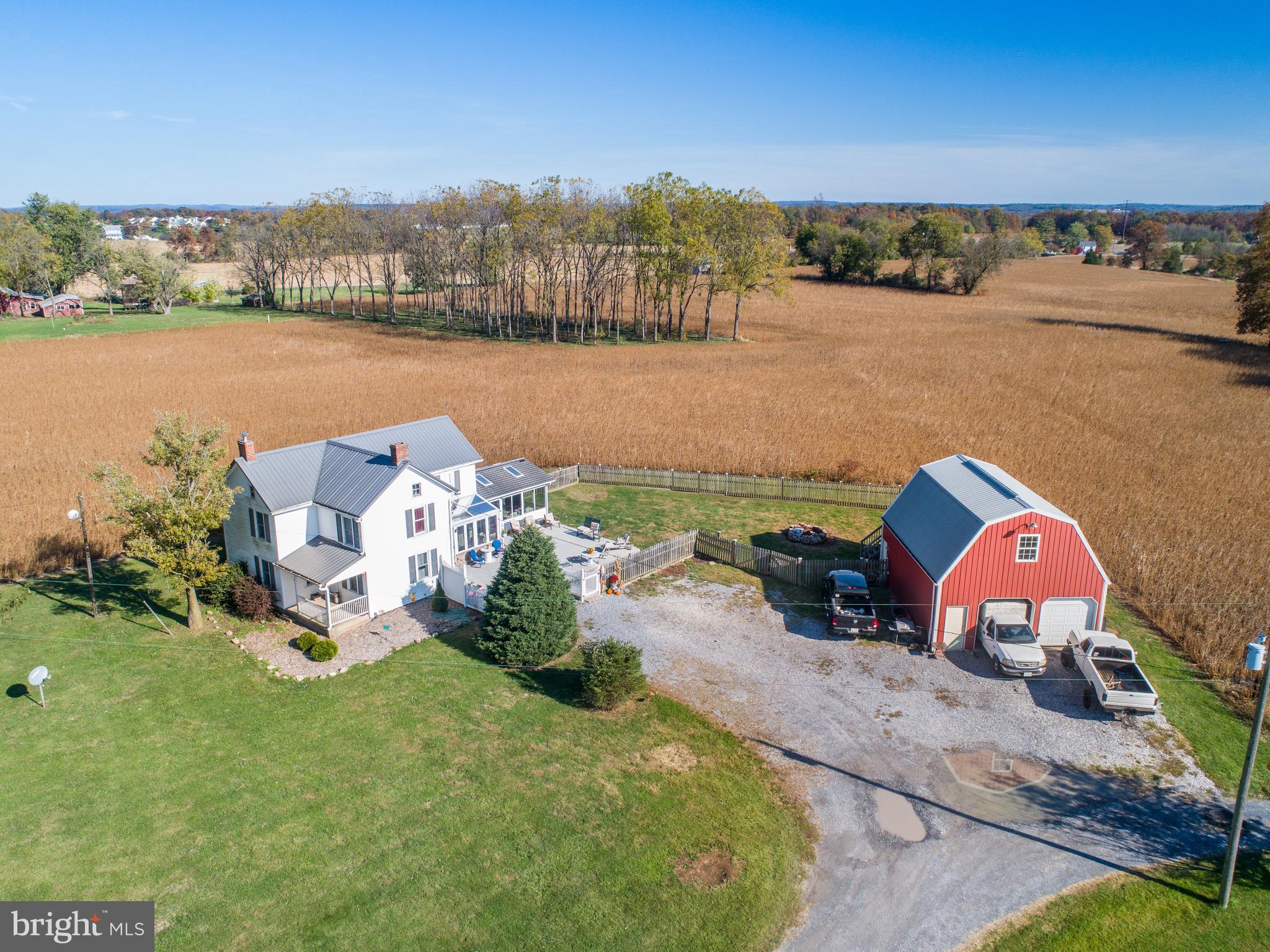 4855 Stonesifer Road Taneytown, MD 21787 - Photo 43 of 65 an aerial view of a house with outdoor space and lake view