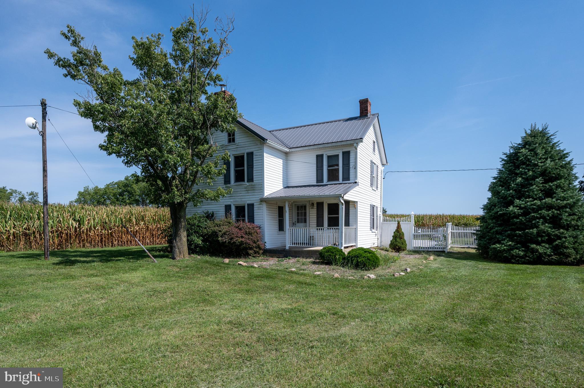 4855 Stonesifer Road Taneytown, MD 21787 - Photo 59 of 65 a front view of a house with a garden