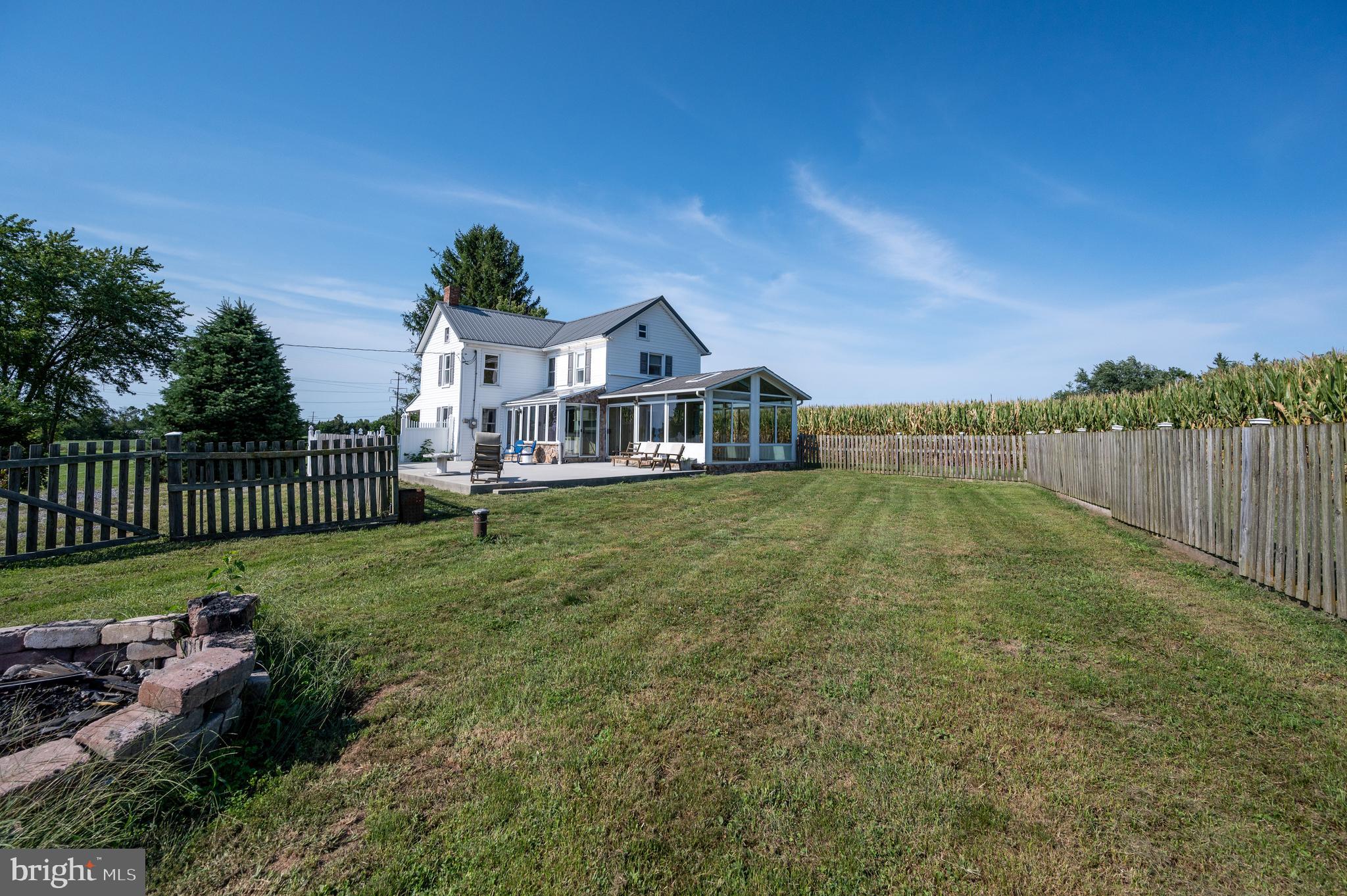 4855 Stonesifer Road Taneytown, MD 21787 - Photo 60 of 65 a front view of a house with a yard table and chairs