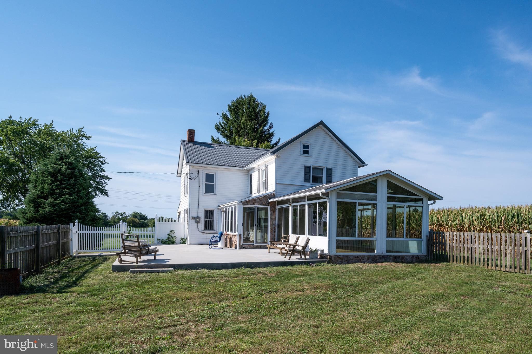 4855 Stonesifer Road Taneytown, MD 21787 - Photo 62 of 65 a front view of a house with swimming pool having outdoor seating
