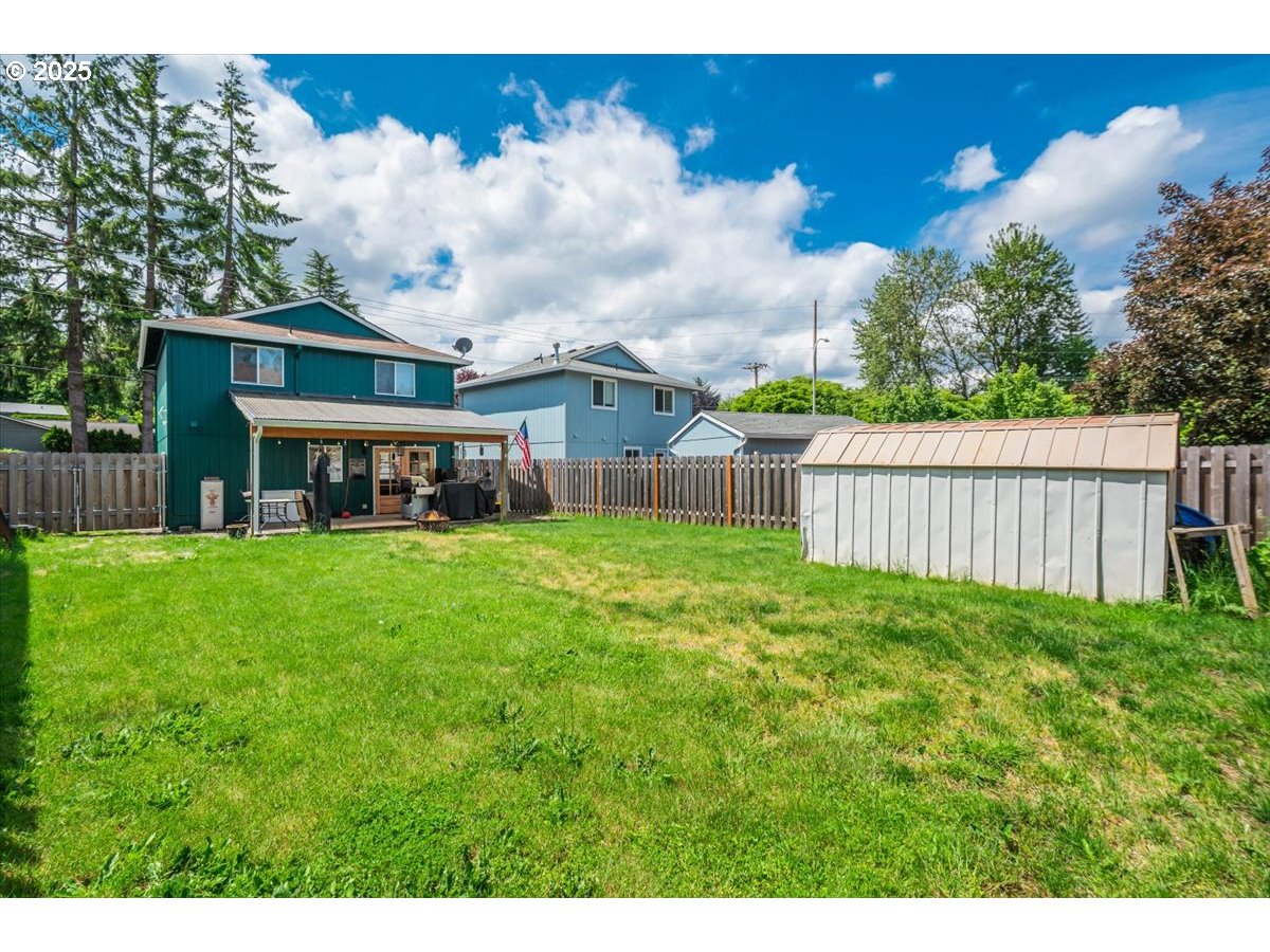 3977 Southeast Salquist Road Gresham, OR 97080 - Photo 23 of 33 a view of a house with a back yard