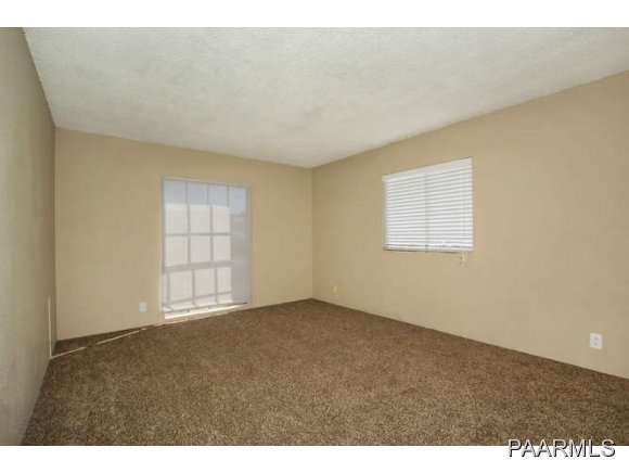 4430 East Waldron Road Rimrock, AZ 86335 - Photo 18 of 24 an empty room with windows